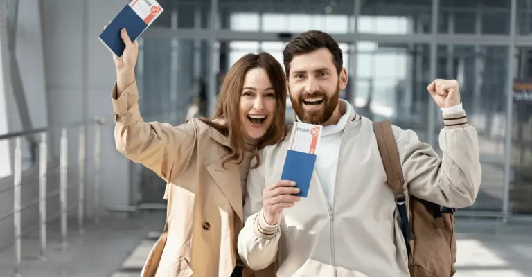 Applying for a partner visa in Australia a couple holding visa forms