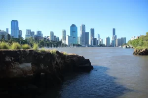 Modern Gold Coast city skyline sunset regional migration Australia 2025.