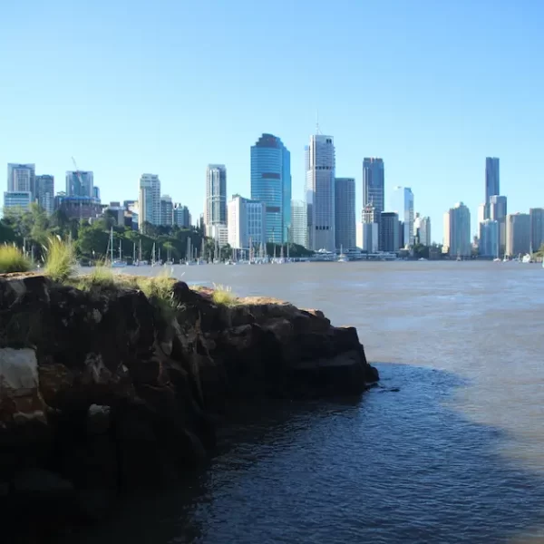 Modern Gold Coast city skyline sunset regional migration Australia 2025.