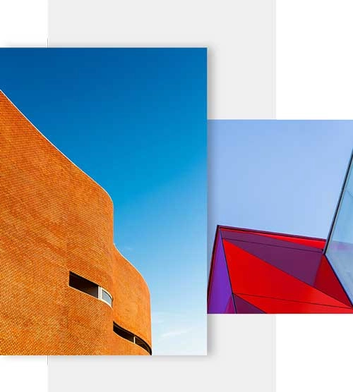 Modern abstract architectural design with vibrant geometric structures and contemporary urban aesthetics under clear sky